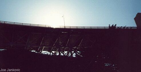 Underside of Bridge Backlit by Sun