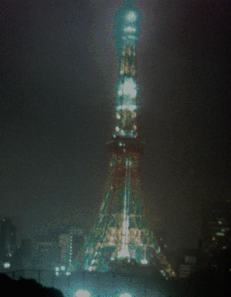 Tokyo Tower at night, through rain (photograph)