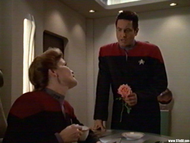 Chakotay offers Kathryn a rose