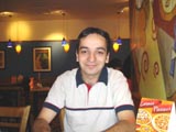 Me at Pizza the Hutt, as I call it. =-) I love pepperoni pizza. Yeah, my name IS Rafael. So???