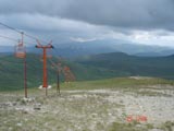 A view of Valea Dorului (Dorului Valley, hard to translate.). We are at 6000 ft up here on the other side of the peak. Note the high mountains in the distance. Kinda wild back there, probably very cold in the winter.