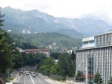 A view of the Sinaia main road with the mountains in the background.