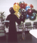 Death 
brings Balloons