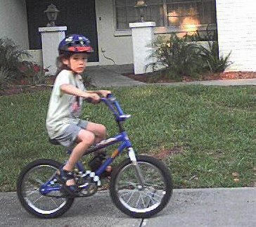 Vincent's riding past a neighbor's house