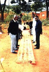 Men in Malawi 
playing a variation of the gebeta game