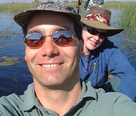 Okavango Delta, Botswana: KAREN AND MARC MIRACULOUSLY SURVIVE MOKORO [dug-out canoe] TRIP -- SOMEHOW MANAGE TO TAKE PHOTOGRAPH AS WELL!