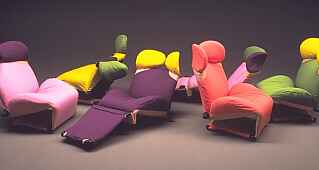 a group of Kita's Wink Chairs by Cassina