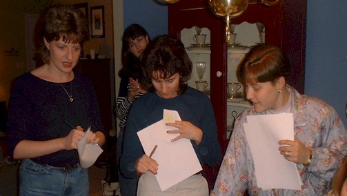 Missy Hatfield, Heather Morris, and Mia Ferguson playing shower games.