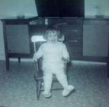 I remember that old rocking chair, my "footie" pajamas and that big, old stereo. Good Memories :)