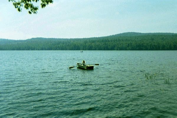 09.jpg -- Margaret rowing on West Pond, Parsonsfield