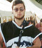 Marcus carrying the Meridian Banner for opening ceremonies at Pennsic