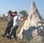 Karen and Doreen (our British friend traveling with us) by a large termite hill - Halali Camp, Etosha NP.    CLICK HERE TO SEE THE LARGER VERSION OF THIS PHOTO