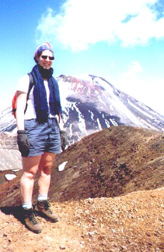 Claudine on Tongariro, with Ngarahoe behind