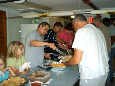 "Jason M. and Antonio M. earn levels to graduate from our Transitions program by feeding the homeless with Grace Covenant Worship Center's feeding the homeless program."