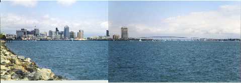 Picture was taken in two shots and then linked together,and shows travel today using the bridge that connects San Diego to Coronado. At one time to cross over to Coronado the quickest way without going around the city, was to use the Ferry Boats that are used now for tourest attraction.