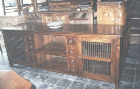 TV buffet, a thick wood and smooth iron in front of it