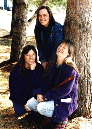 Heath Sisters sitting under a tree