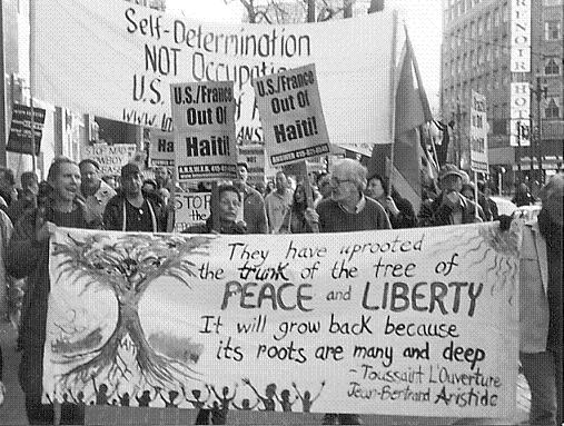 February 28th demonstrators with Haiti signs and banners in San Francisco