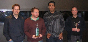 Photo of Rangers players with Presidents C trophies. 