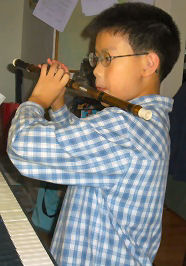 Chris plays flute