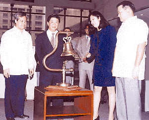 While officiating the listing ceremonies at the PSE.