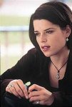 Neve Campbell Hosting a Party