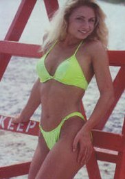 Heather in lime green bikini on beach