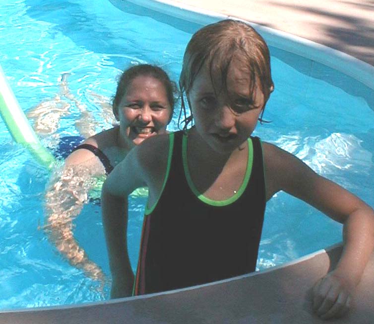 Cathy and Kate in the Lester's pool, Clinton, TN, September 4, 1999