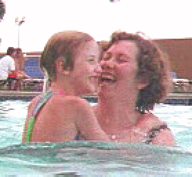 Cathy and Kate in one of those rare mother/daughter moments of pure joy in Reno Hilton's pool.  July, 1998