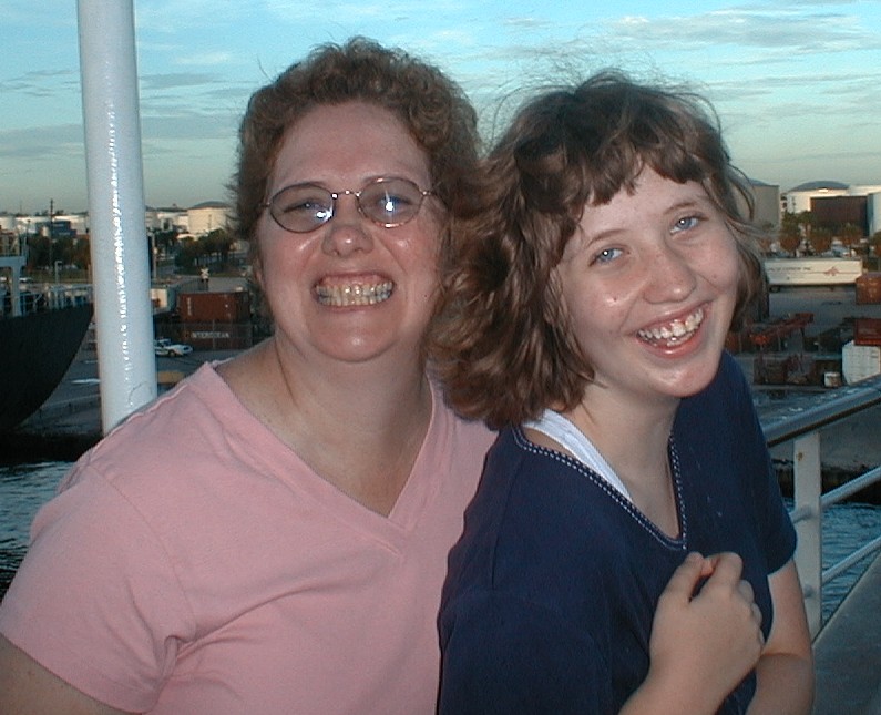 Two girls happy to be setting sail, August, 2004