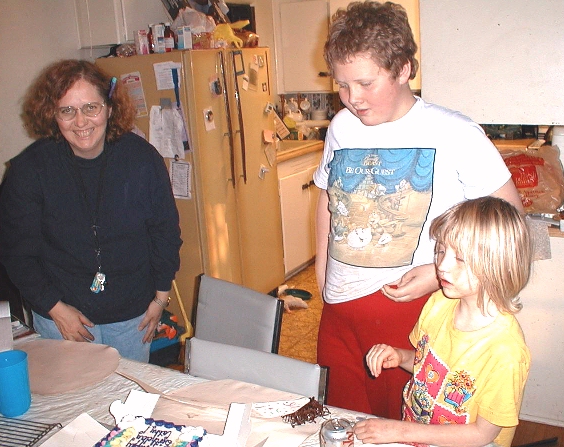 Cathy, Luke, and Kate on Cathy's birthday, February 17, 1999