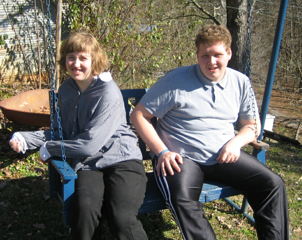 Kate and Luke on the swing at their grandparents' house, November 23, 2006