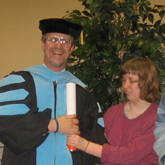 Dr J and Kate sharing the diploma, December 15, 2006