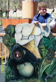 Jeff and Luke trying to do the tourist thing in the Country Fair part of Dollywood, April 1, 2002