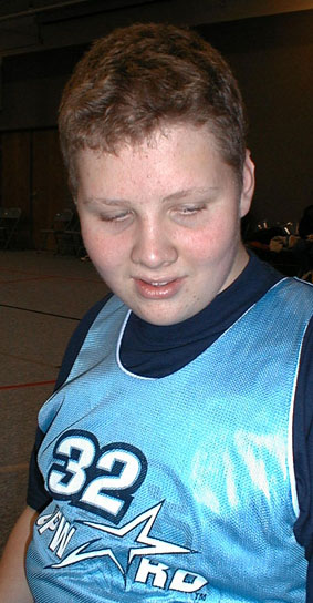 Luke waiting to play basketball, January 14, 2001