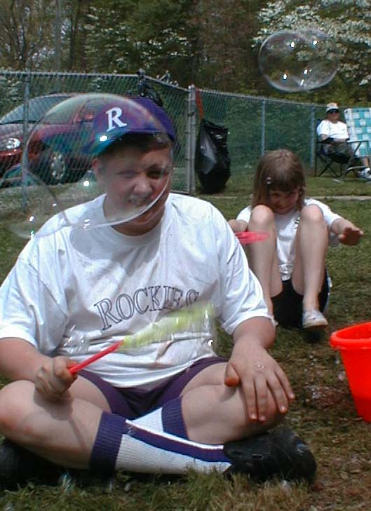 Luke and Kate making bubbles at the Bemis' annual Easter Egg Hunt, April 14, 2001