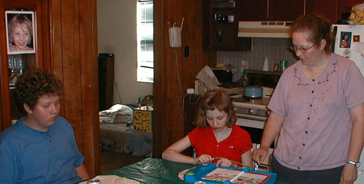 Luke, Kate, and Cathy with the LeapPad present, May 23, 2002