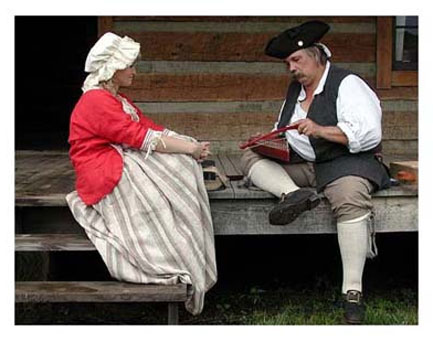 Reenactor plays psaltry at Fort Randolph