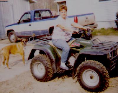 me on my Quad, with Bud nearby