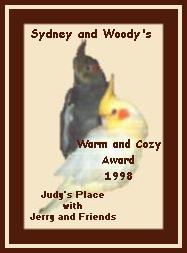 Sydney and Woody's Warm and Cozy Award 1998, by Judy's Place