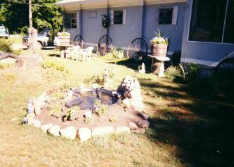 pretty view of the pond and the side yard