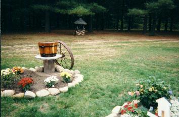 picture of wagon wheel rock garden