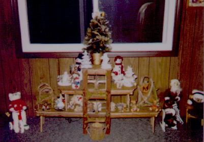 wooden shelf with Christmas collectibles