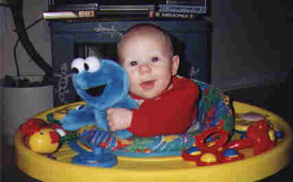 Ethan in his exersaucer