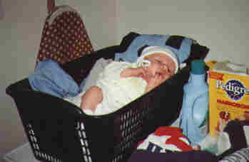 Ethan in laundry basket