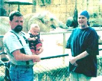 Grant, Cora and Adrienne at the zoo.