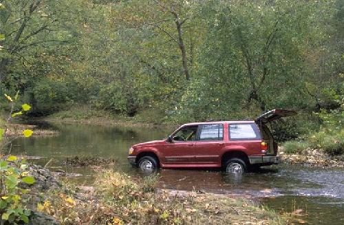 A Rented Explorer, stuck in the river at Chip's cabin