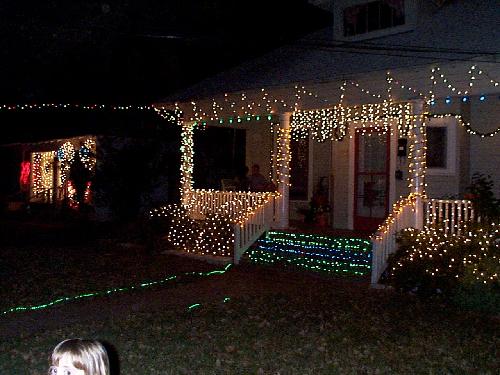 Nice house and the owners out on the porch