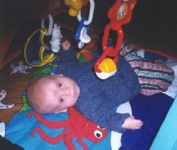 Matthew with his play gym