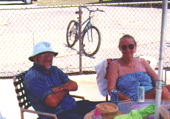 Mom and Dad by the pool